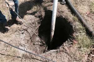 Digging post holes vacuum excavator 3